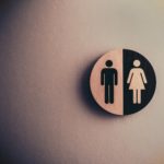 male and female signage on wall