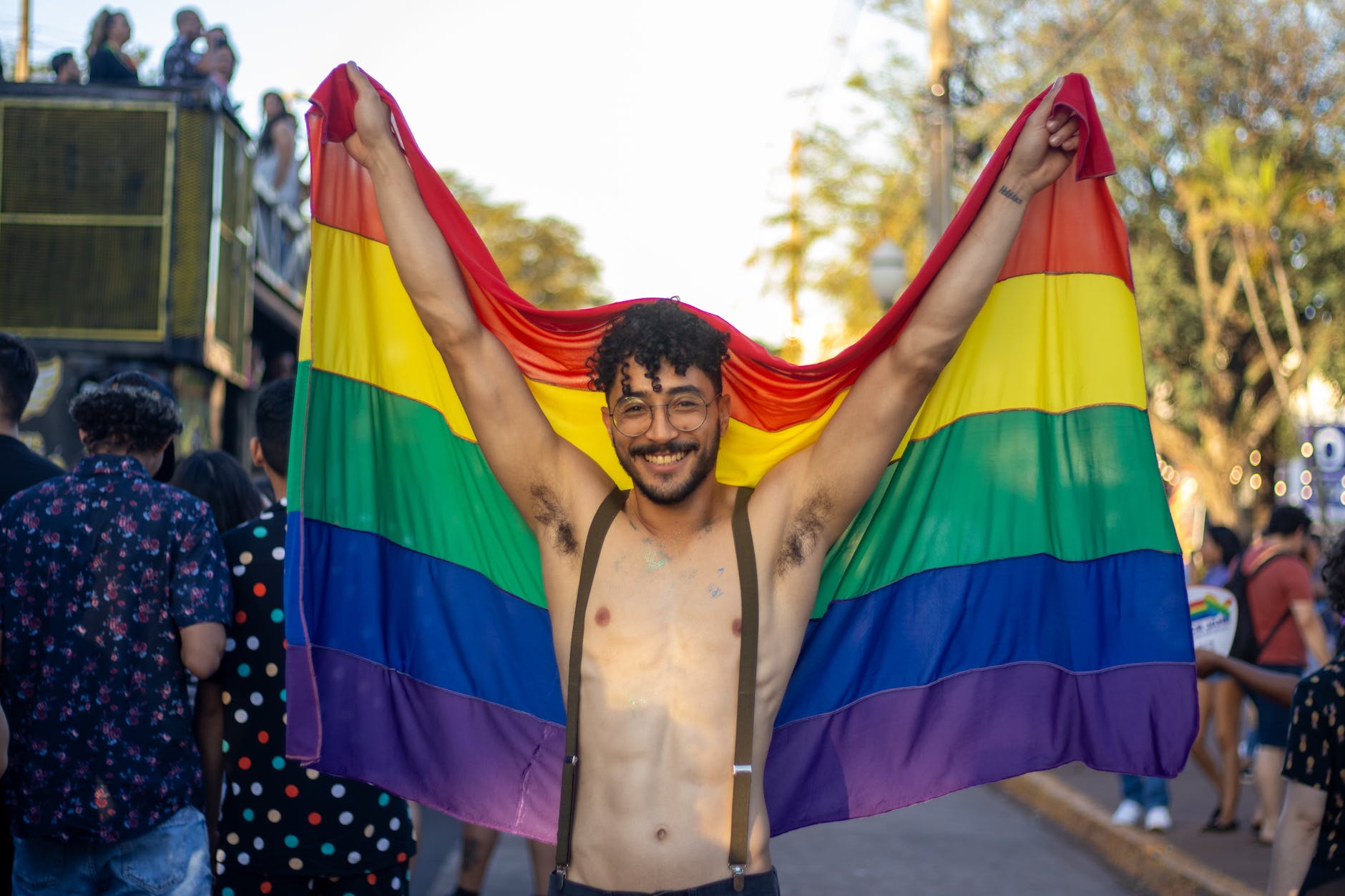 happy man with lgbt flag